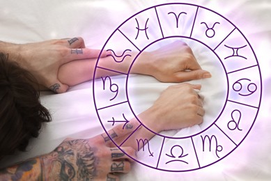 Sexual compatibility. Zodiac wheel and passionate couple having sex on bed, closeup of hands