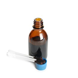 Photo of Bottle of medical iodine and cotton buds on white background