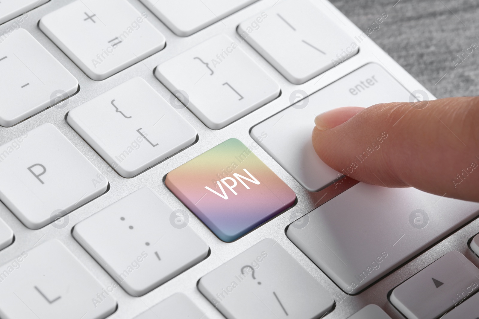 Image of VPN concept. Woman pressing button on computer keyboard, closeup