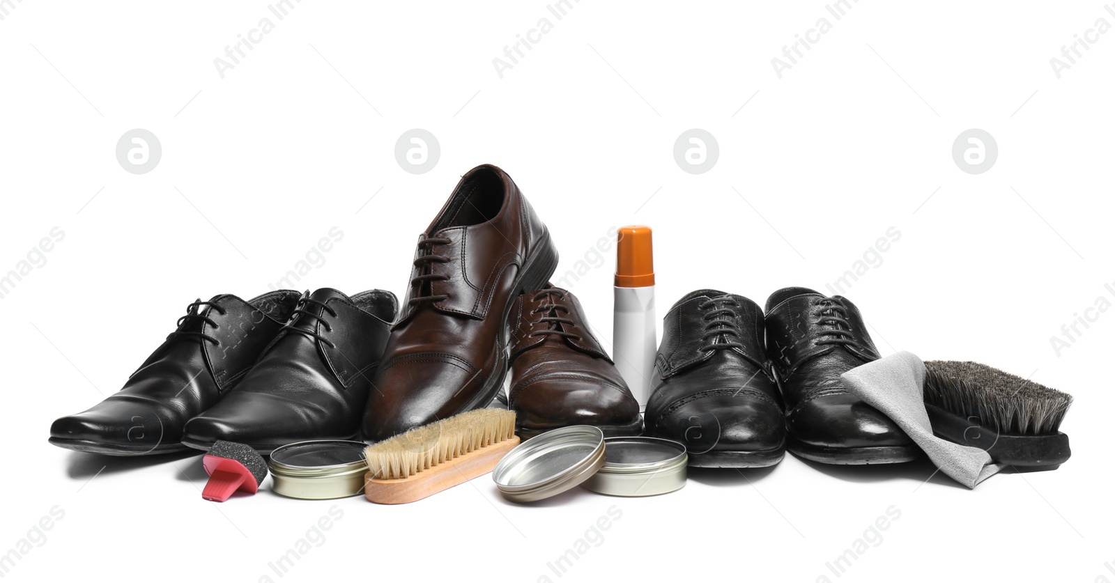 Photo of Stylish men's footwear and shoe care accessories on white background