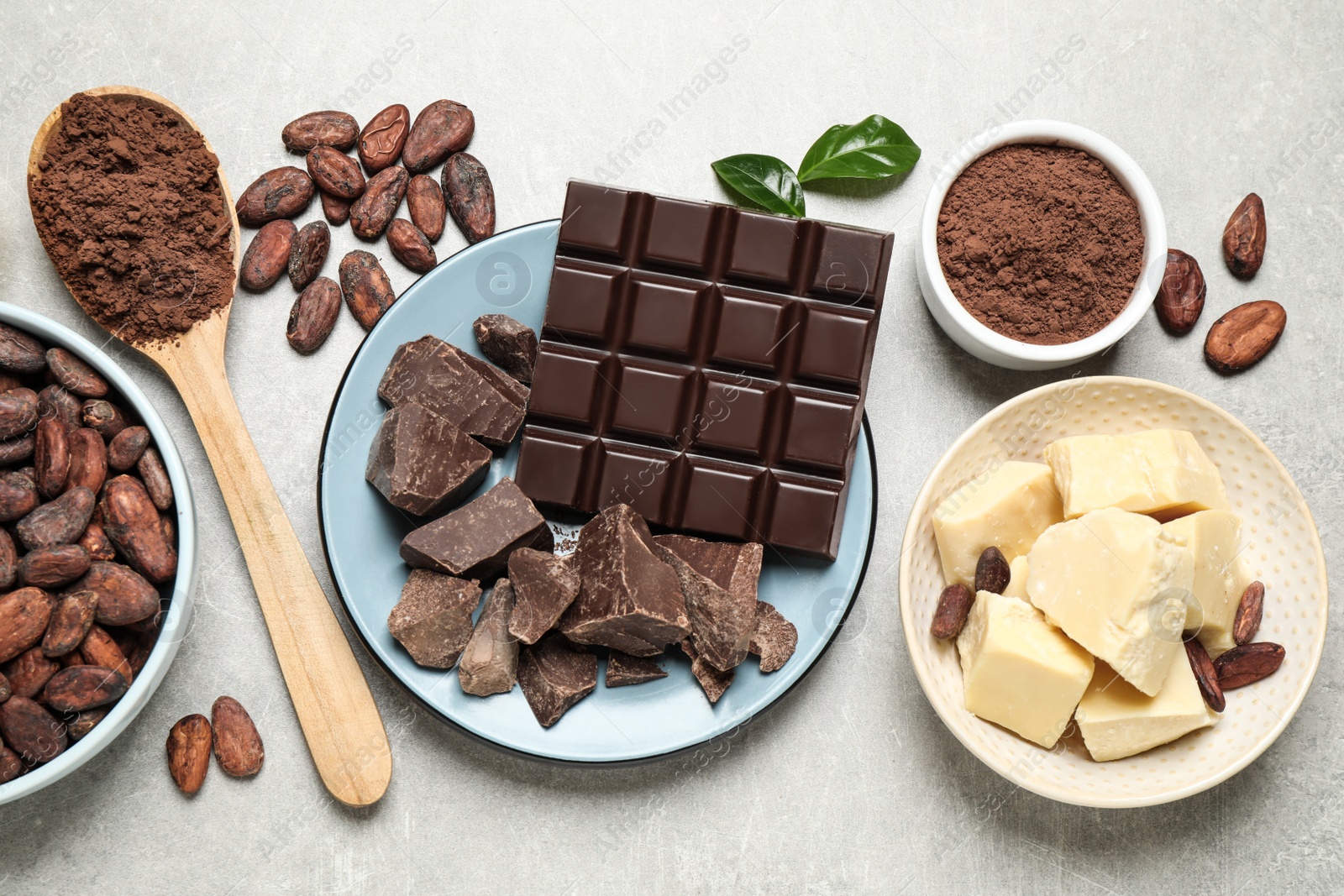 Photo of Flat lay composition with organic cocoa butter on light grey table