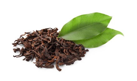 Photo of Pile of Traditional Chinese pu-erh tea and fresh leaves isolated on white