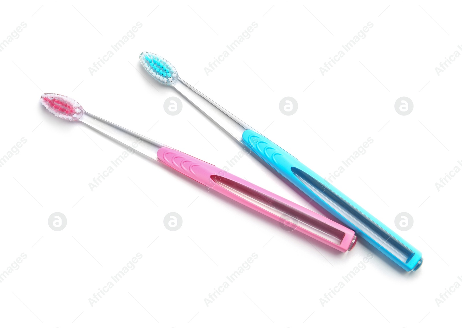 Photo of Color toothbrushes on white background. Dental care