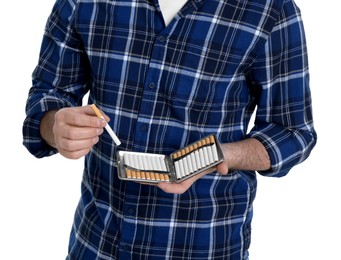 Photo of Man taking cigarette from case isolated on white, closeup