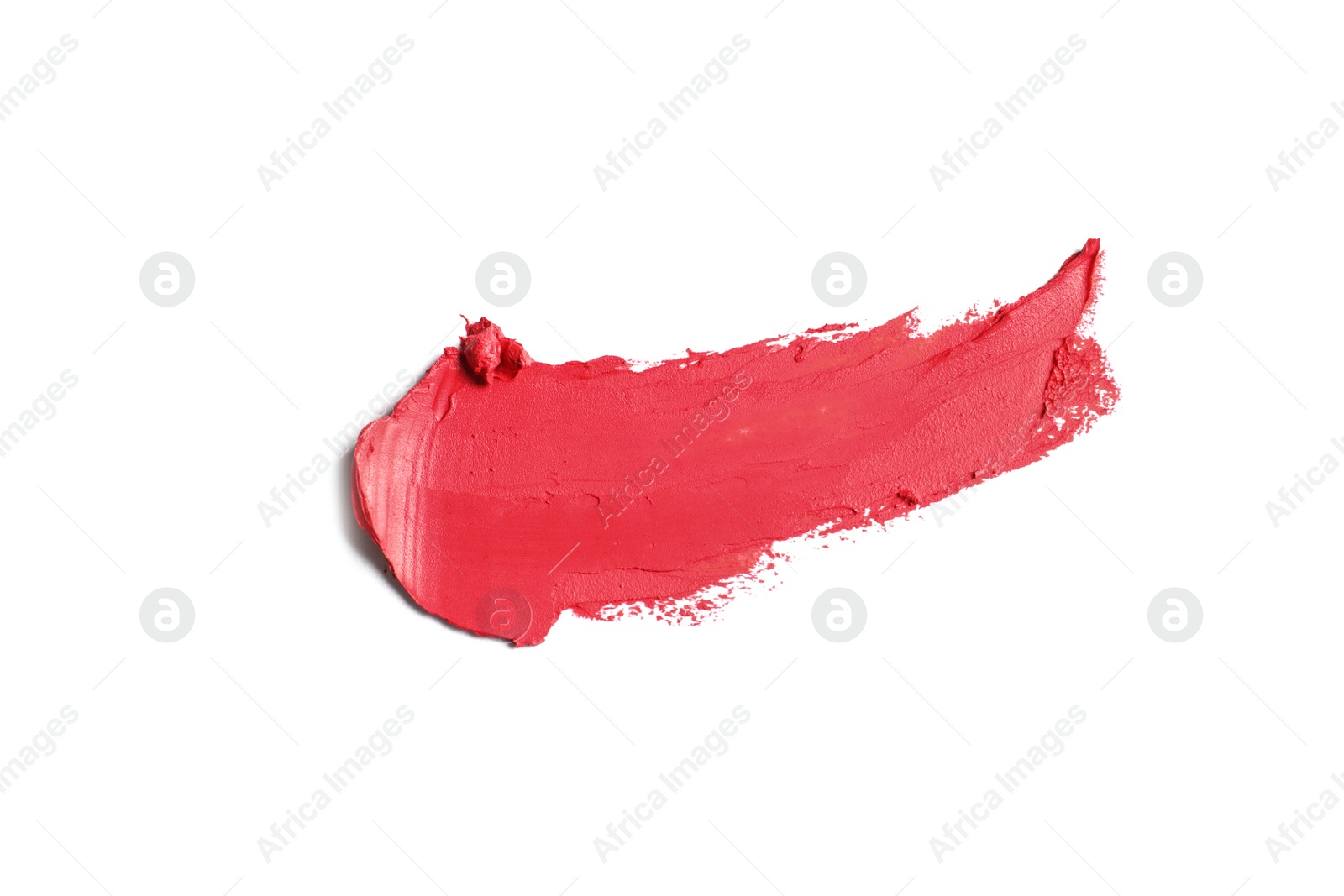 Photo of Stroke of lipstick on white background, top view