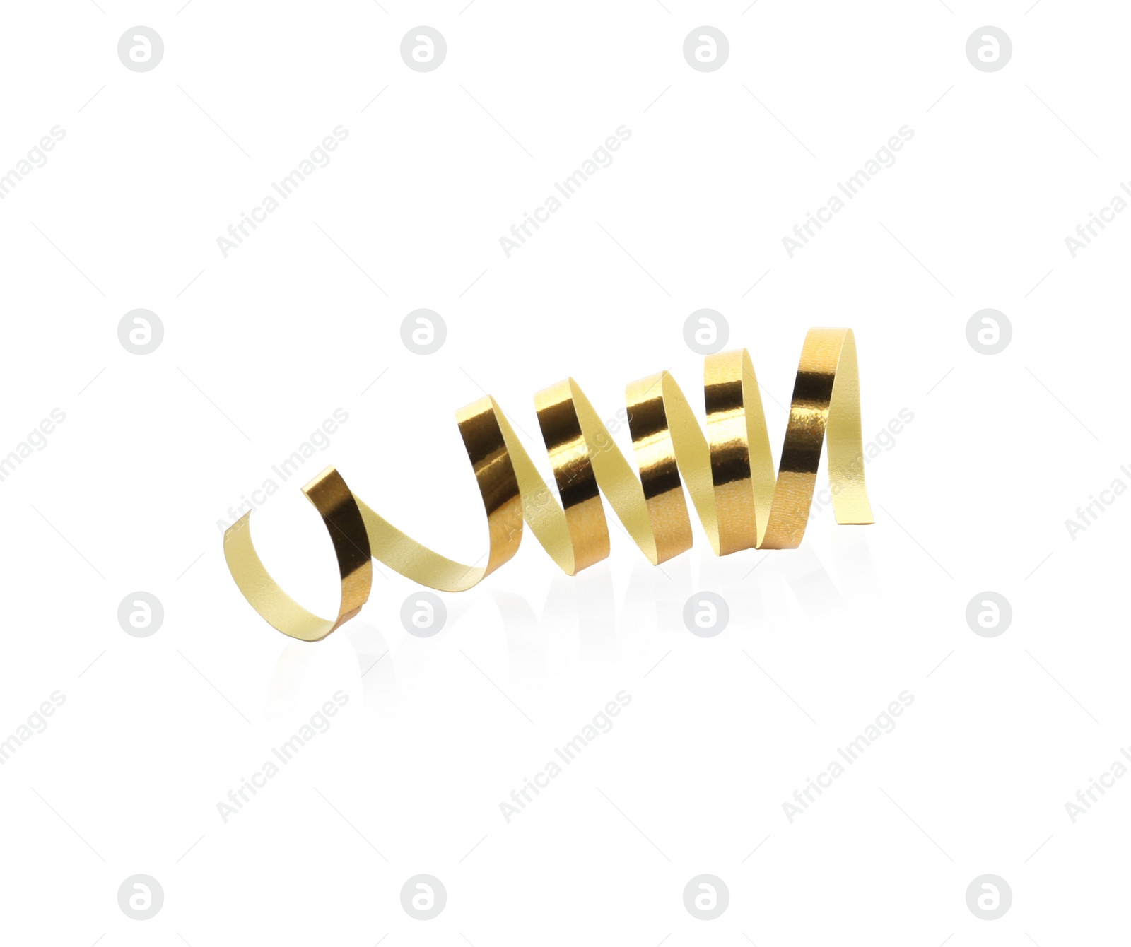 Photo of Shiny gold serpentine streamer on white background. Festive decor