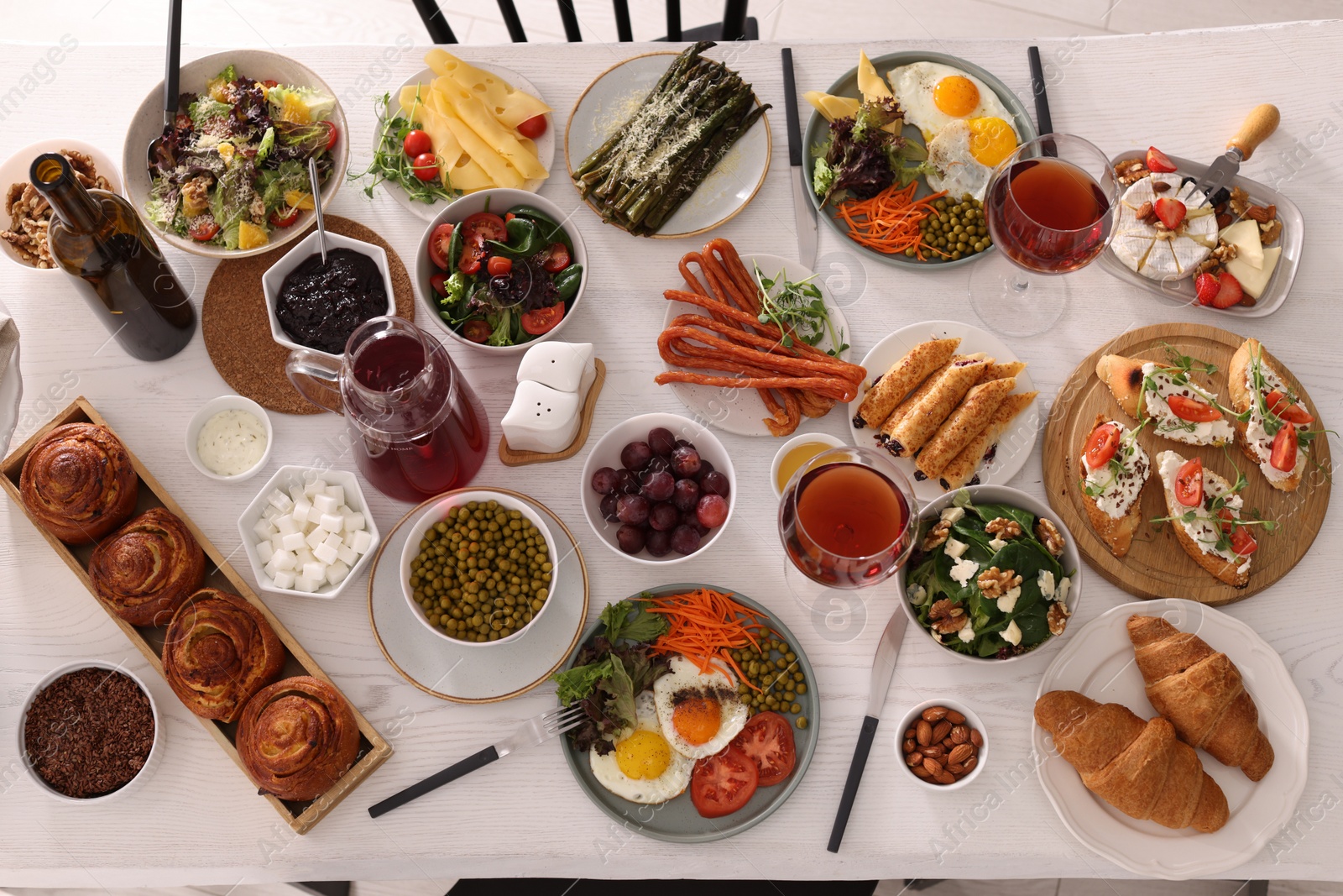 Photo of Many different dishes served on buffet table for brunch, flat lay