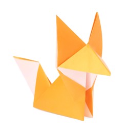 Photo of Origami art. Handmade orange paper fox on white background