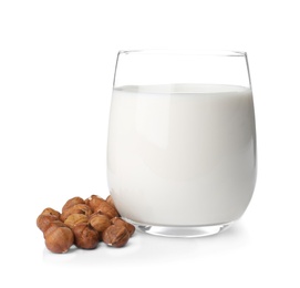 Glass with hazelnut milk on white background