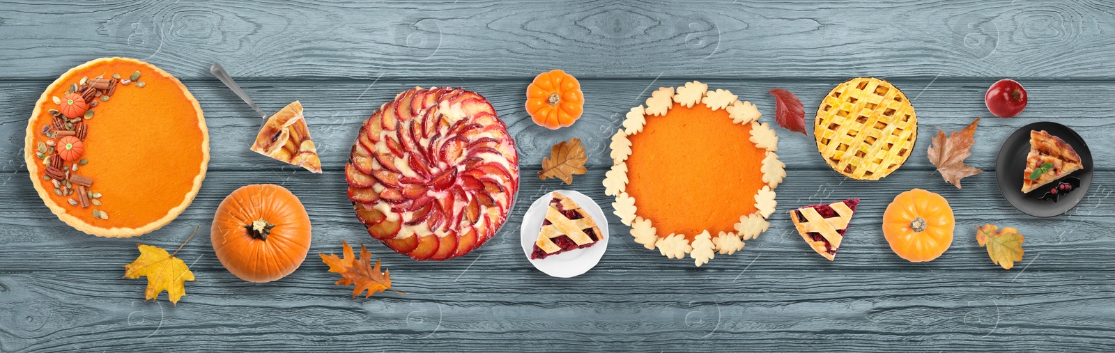 Image of Flat lay composition with different tasty pies on wooden table. Banner design