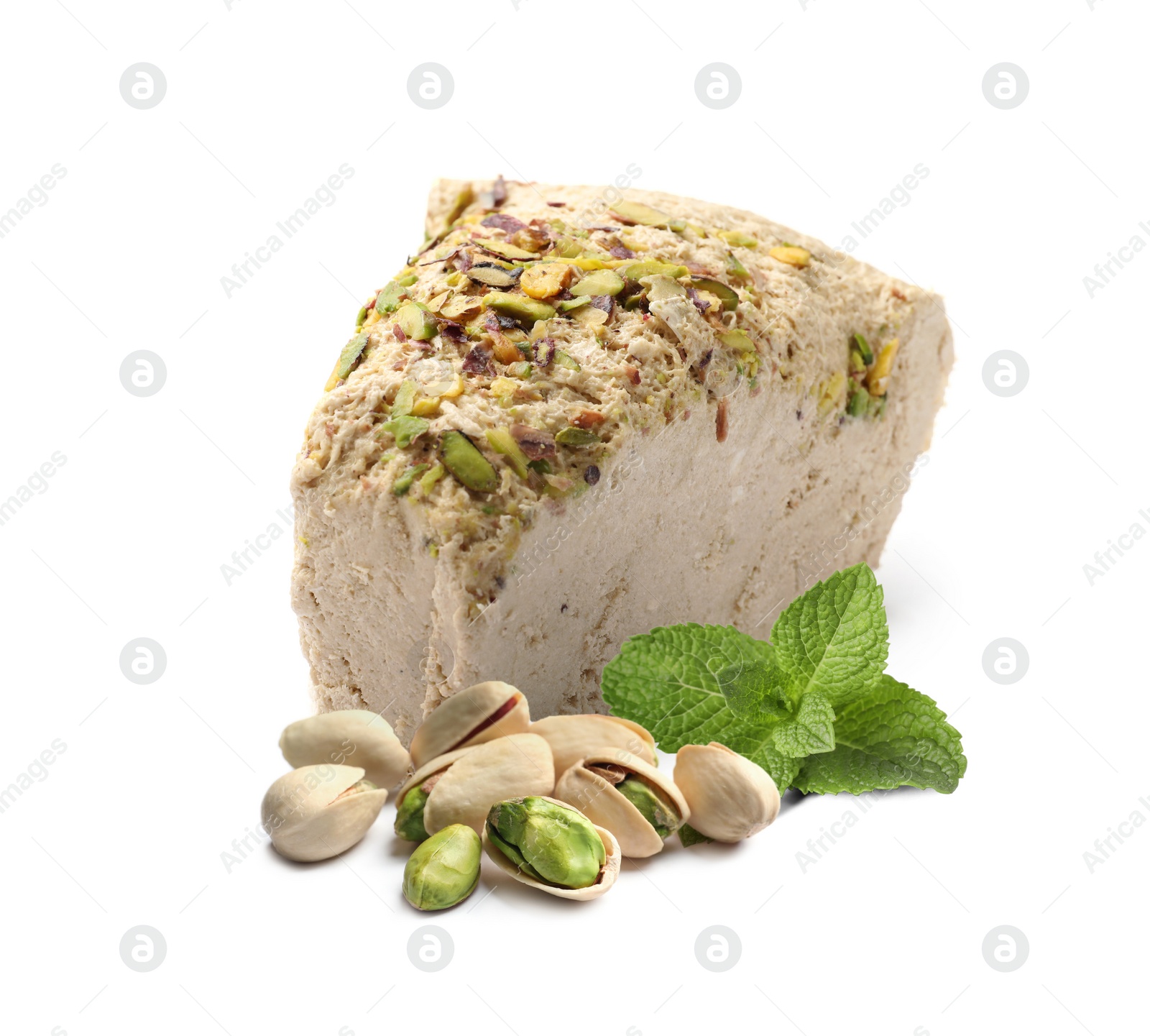 Image of Tasty halva with pistachios and mint leaves isolated on white