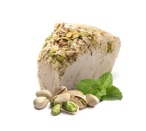 Image of Tasty halva with pistachios and mint leaves isolated on white