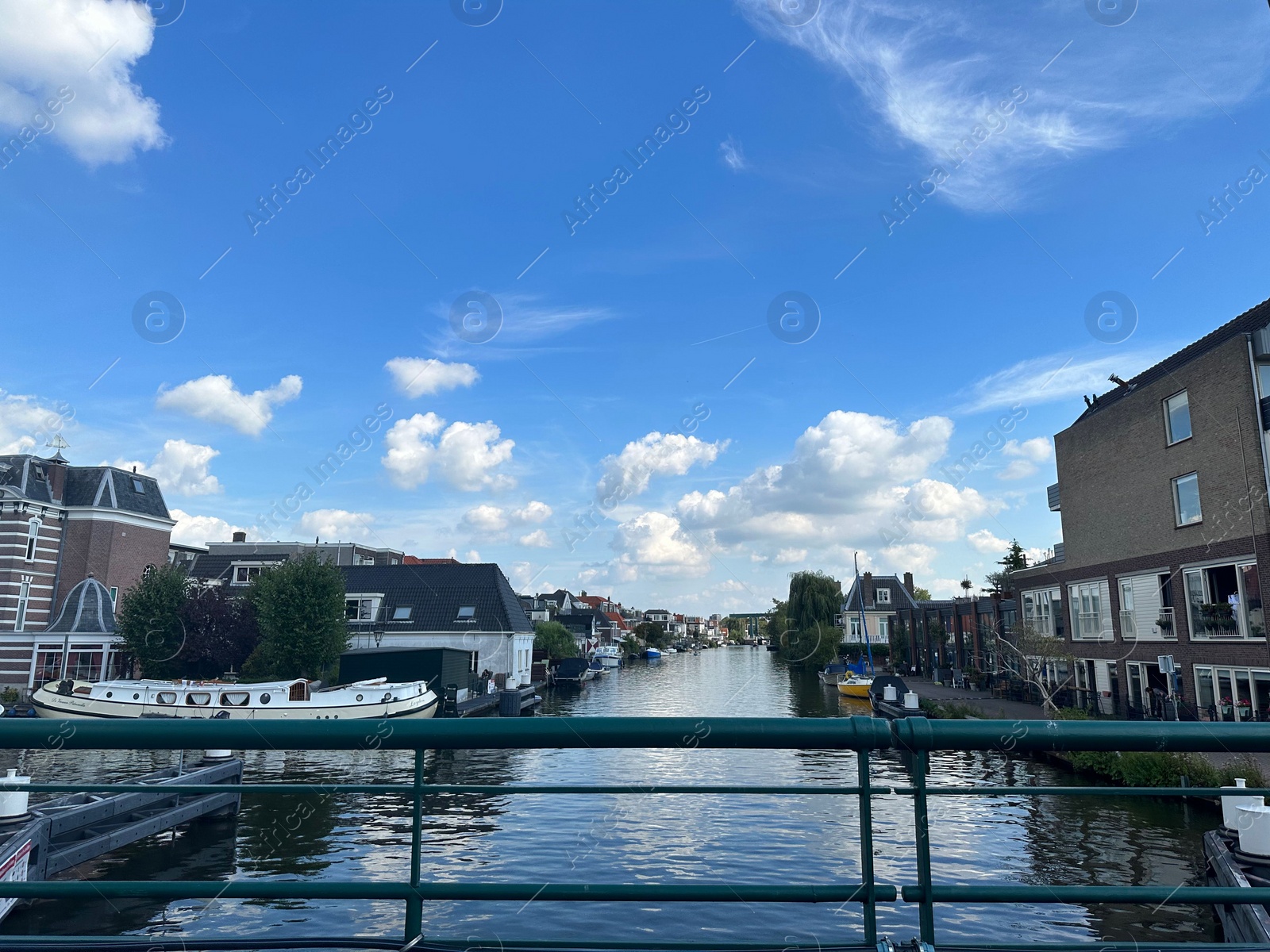 Photo of View on buildings and picturesque water canal in city