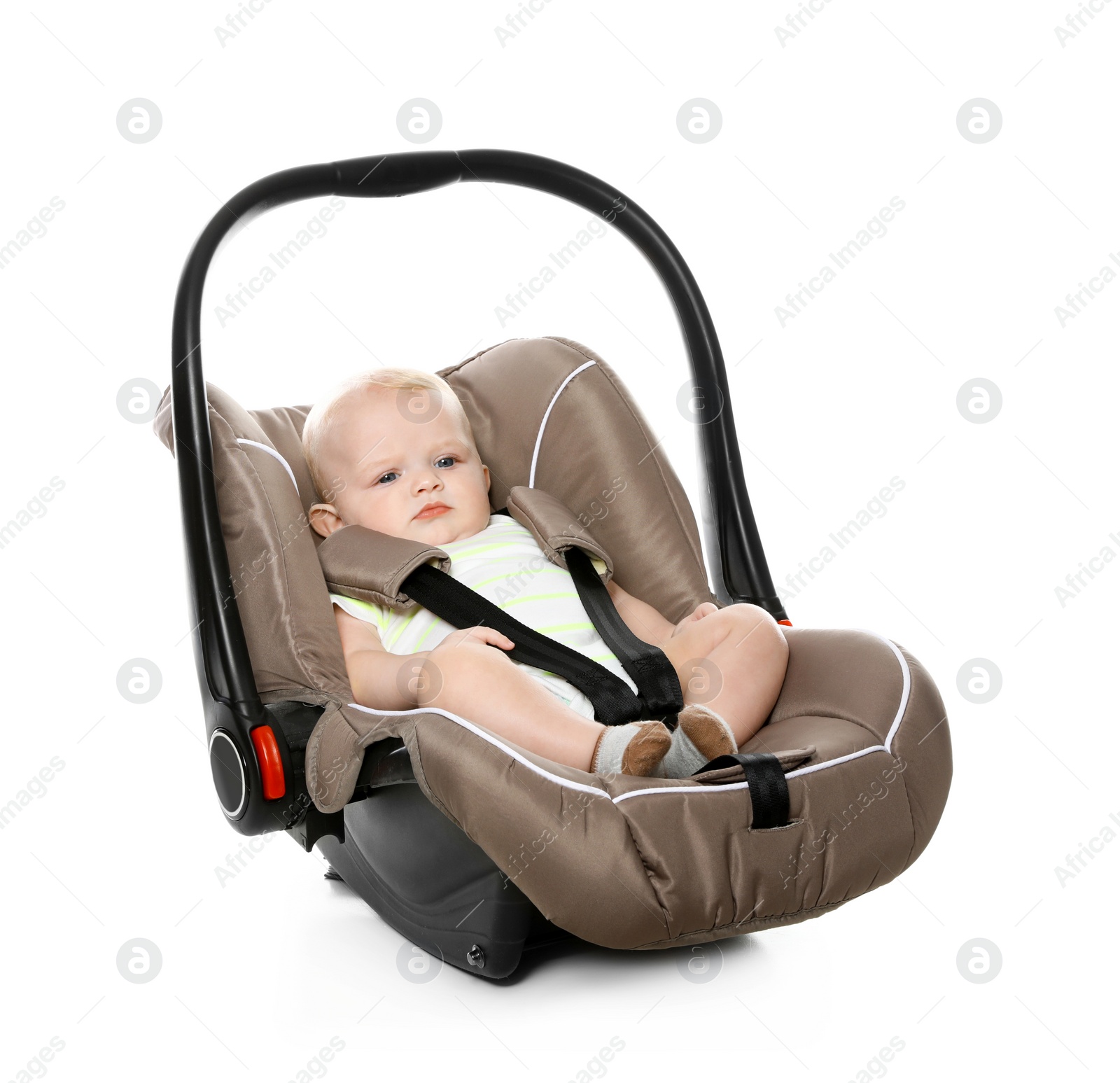 Photo of Adorable baby in child safety seat on white background