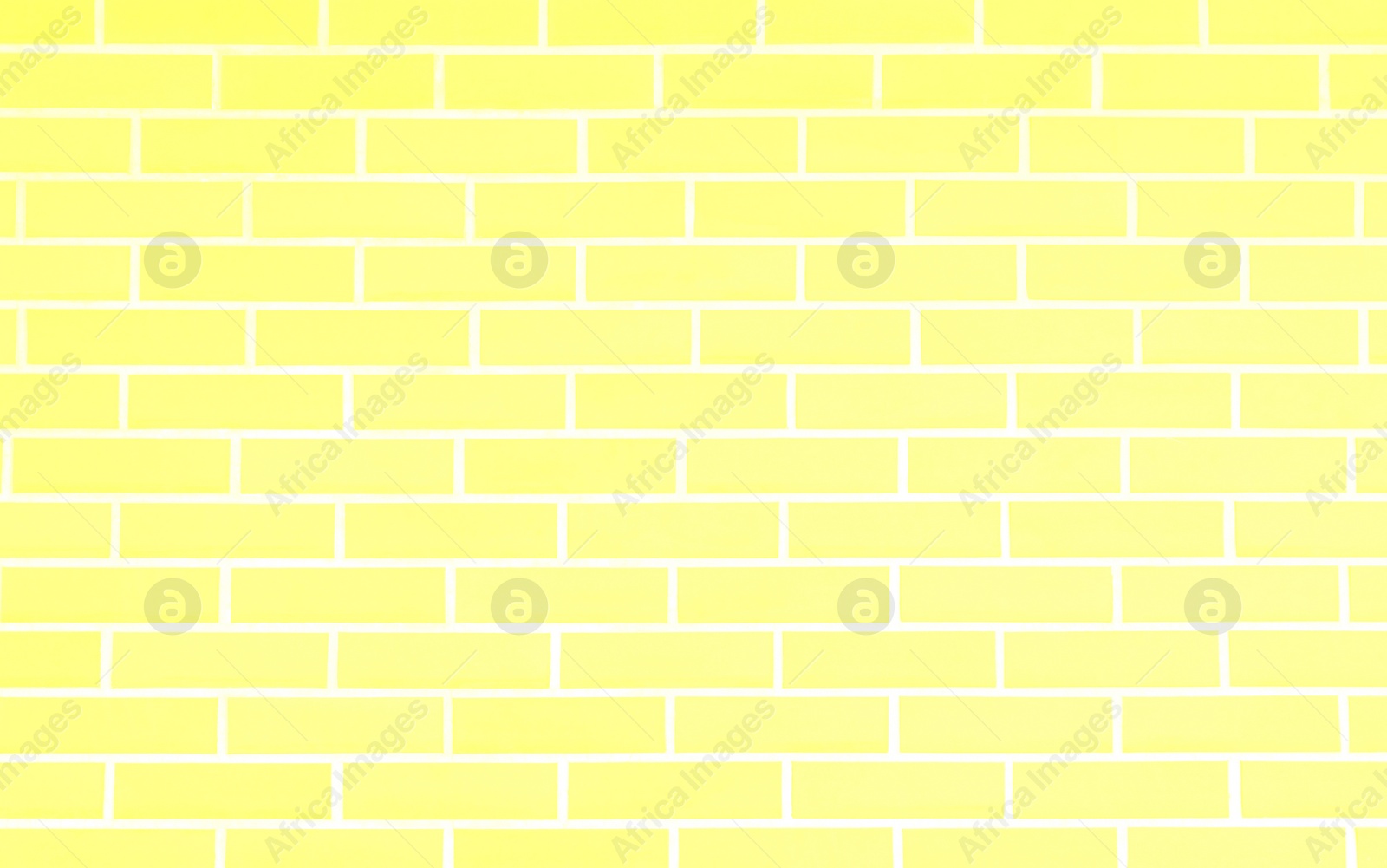 Image of Texture of light yellow color brick wall as background