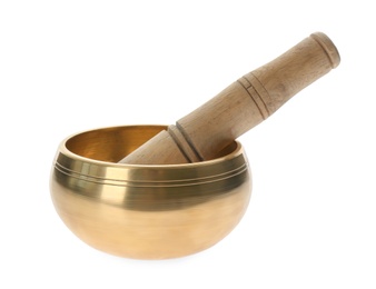 Photo of Golden singing bowl and mallet on white background.  Sound healing