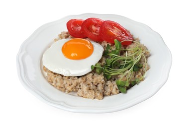 Delicious boiled oatmeal with fried egg, tomato and microgreens isolated on white