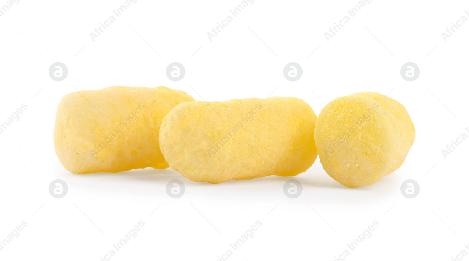 Photo of Tasty puffy corn puffs on white background