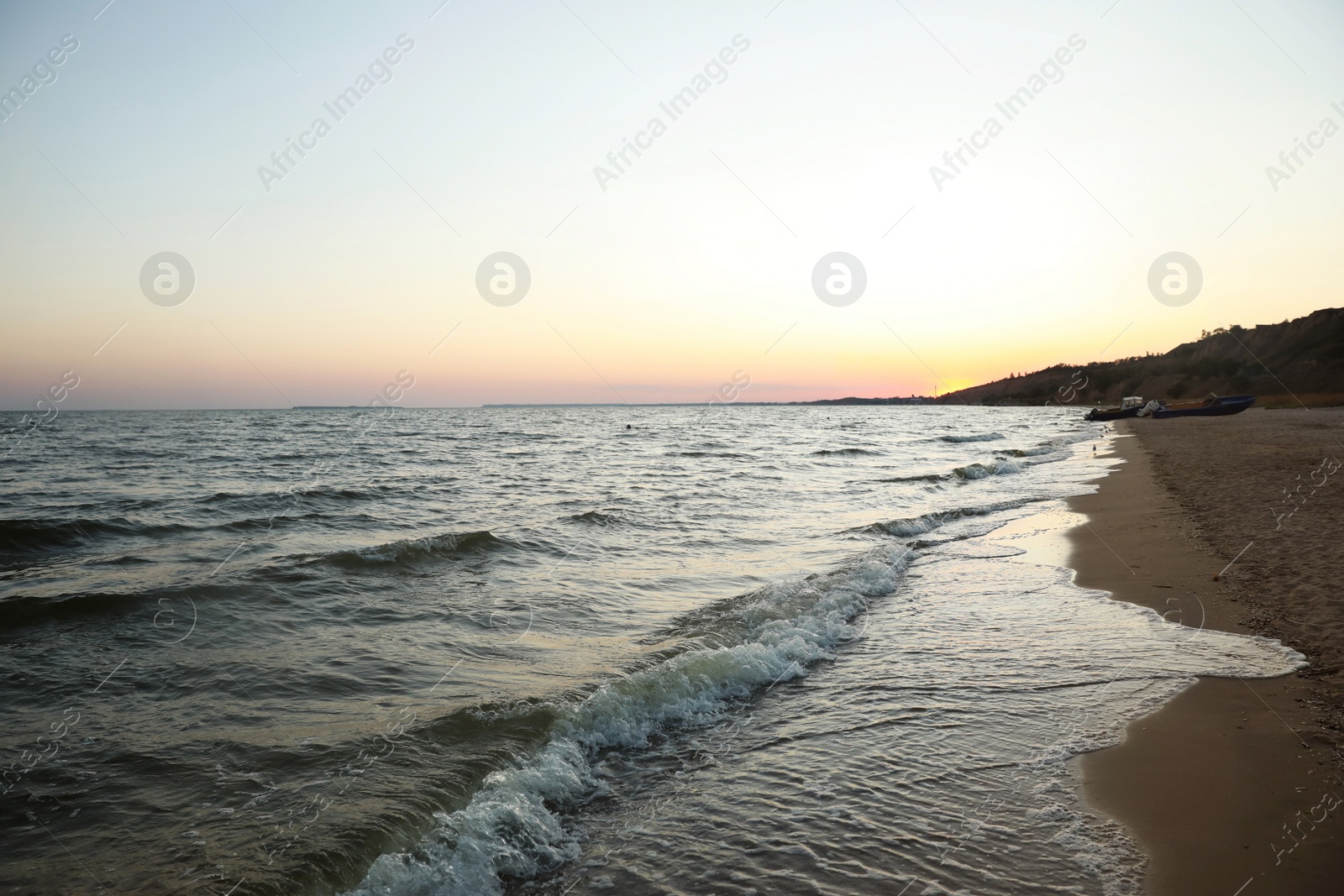 Photo of Beautiful view of sea coast at sunset