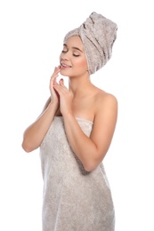 Photo of Portrait of young pretty woman with towels on white background