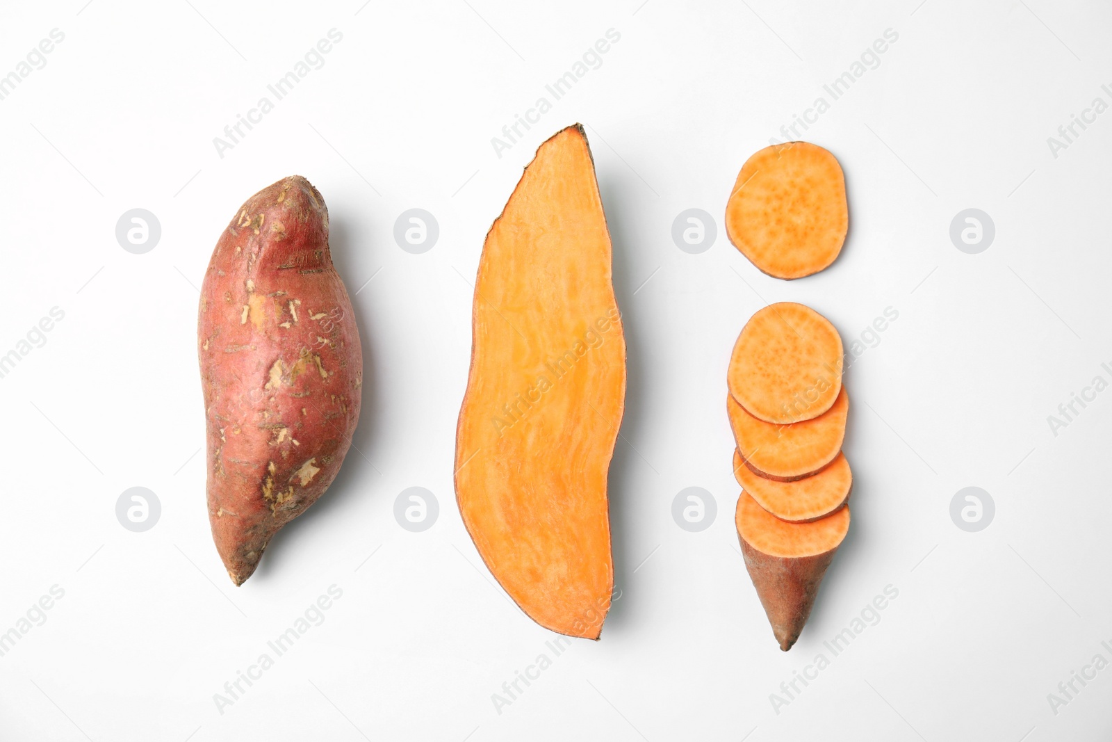 Photo of Composition with sweet potatoes on white background, top view