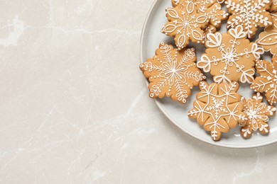 Tasty Christmas cookies on light grey table, top view. Space for text