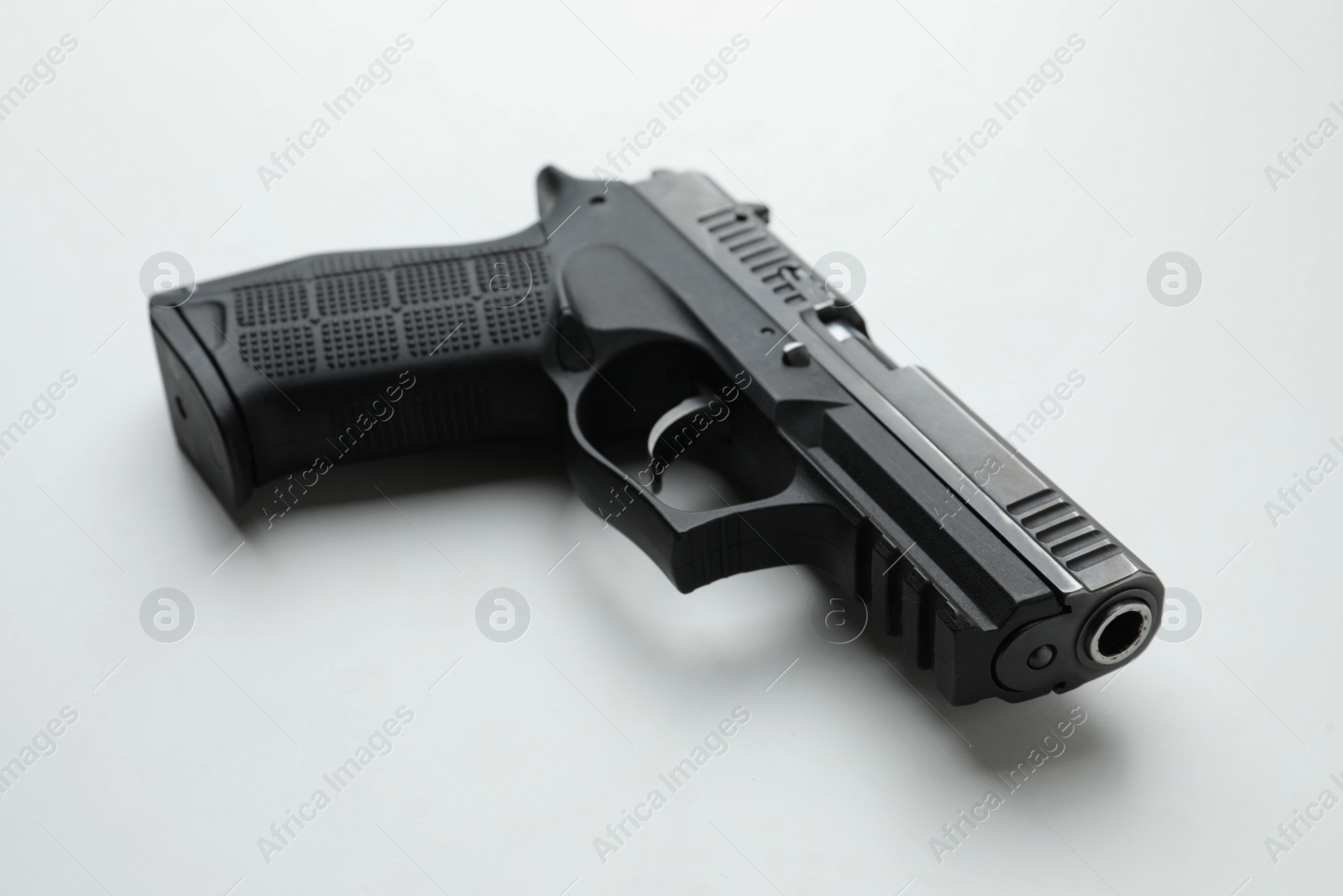 Photo of Semi-automatic pistol on white background. Standard handgun