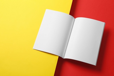 Photo of Empty book pages on color background. Mockup for design