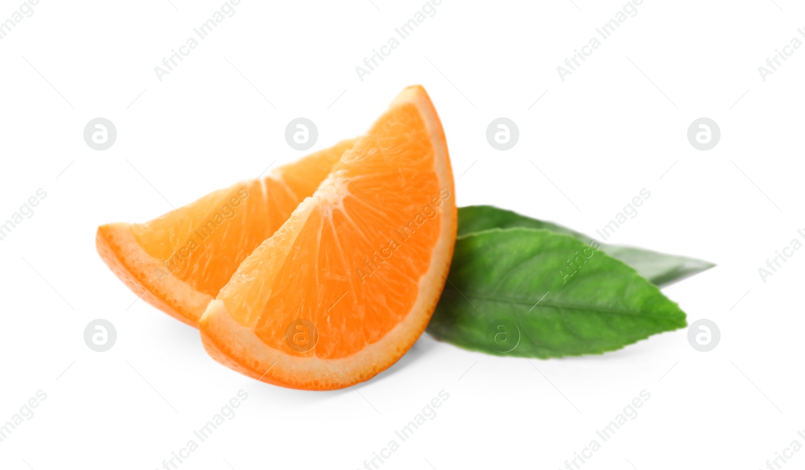 Photo of Slices of fresh ripe orange with green leaves on white background