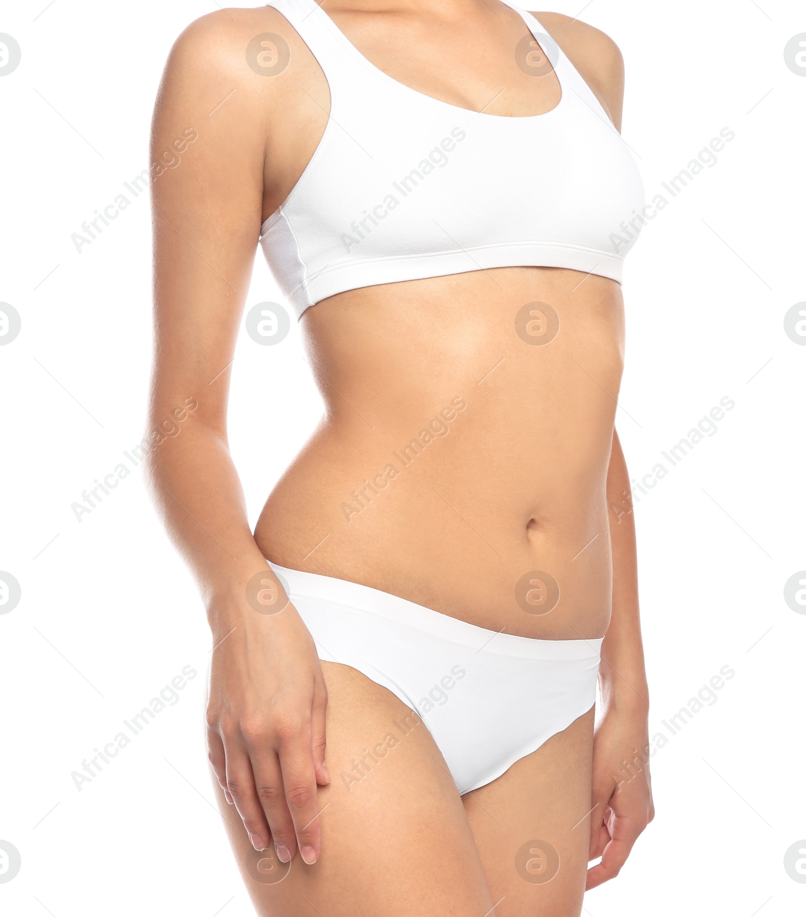 Photo of Young woman showing smooth skin after bikini epilation on white background