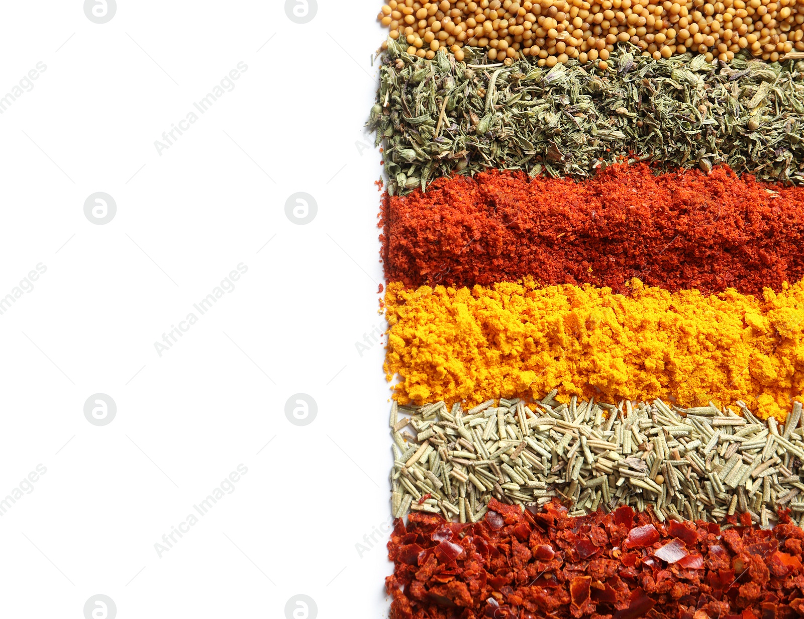 Photo of Rows of different aromatic spices on white background, top view with space for text