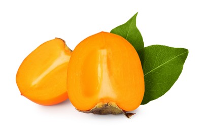 Photo of Halves of delicious ripe juicy persimmons on white background