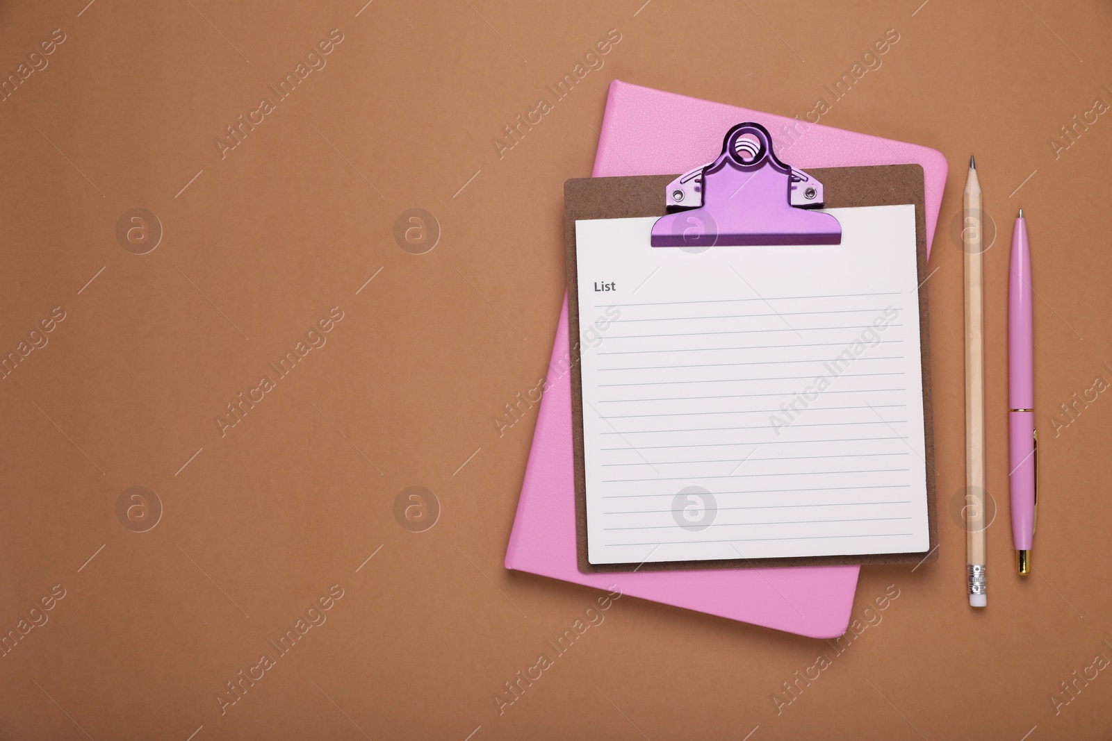 Photo of Clipboard with to do notes, planner, pen and pencil on brown background, flat lay. Space for text