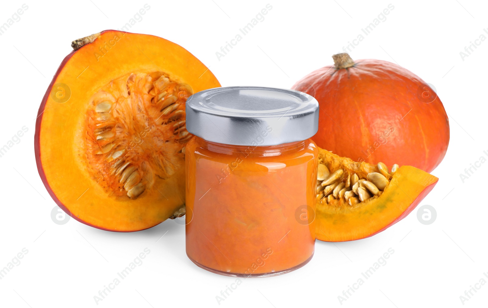 Photo of Jar of pumpkin jam and fresh pumpkins on white background