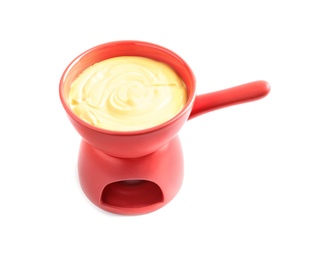 Pot with delicious cheese fondue on white background