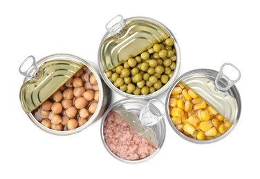 Photo of Open tin cans with different products on white background, top view
