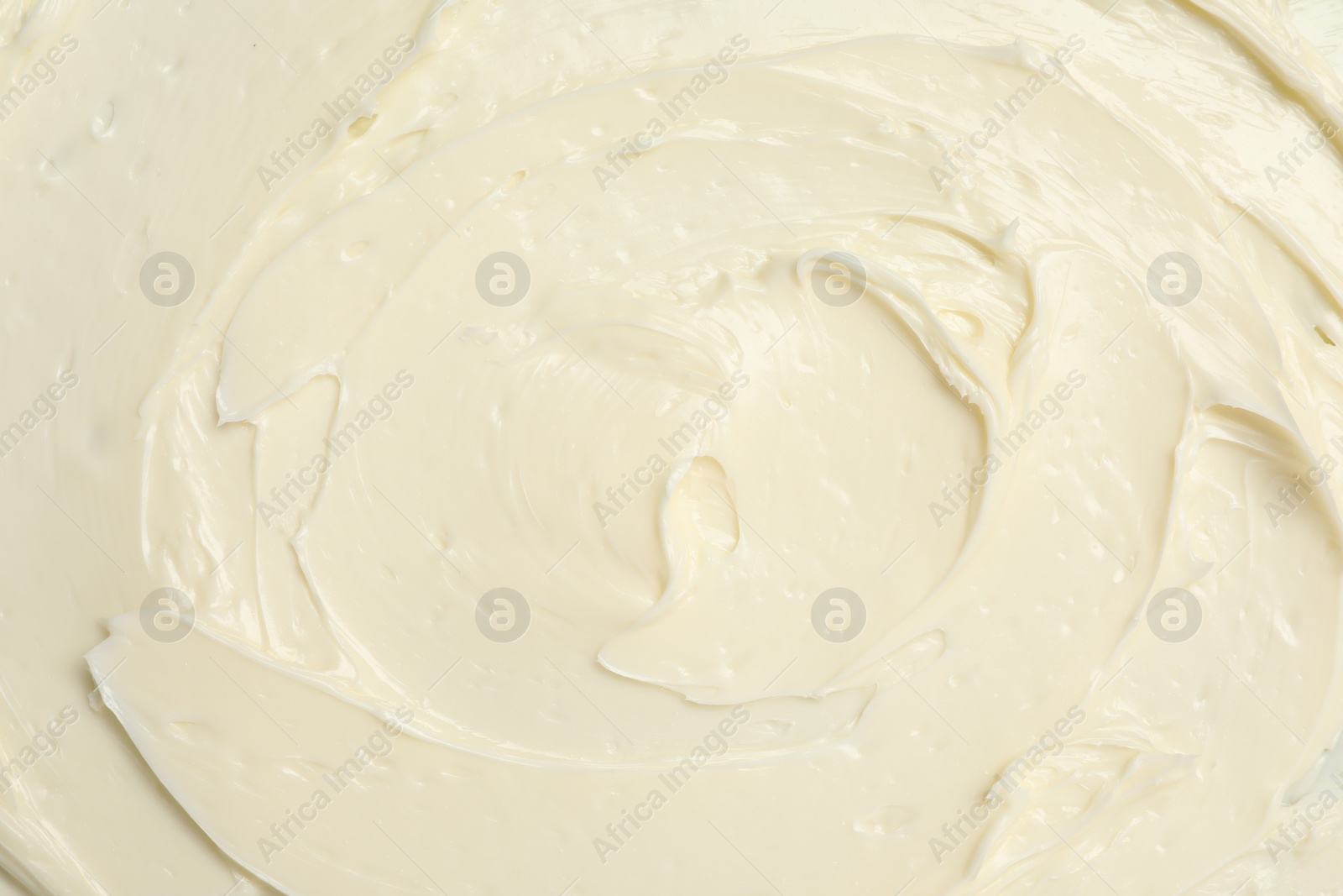 Photo of Texture of tasty butter as background, top view