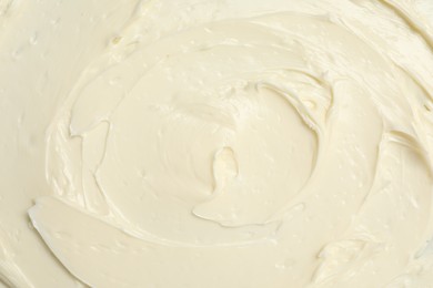 Photo of Texture of tasty butter as background, top view