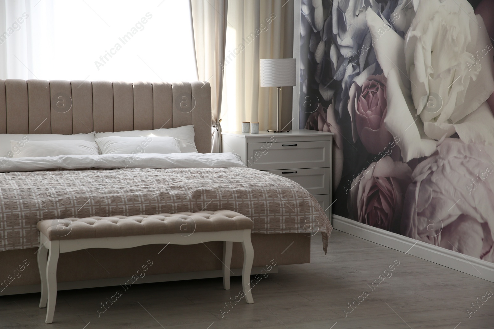 Photo of Beautiful floral photoart work used as wallpaper in bedroom interior