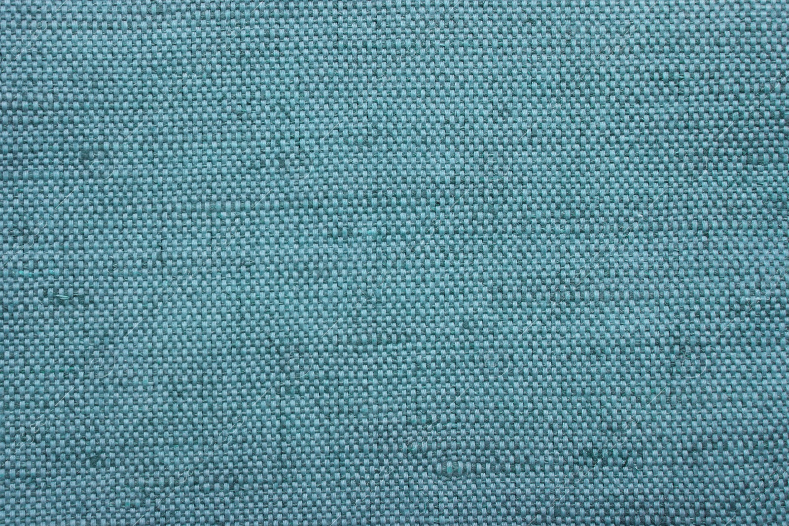 Image of Texture of light blue burlap fabric as background, top view