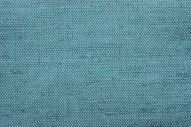 Image of Texture of light blue burlap fabric as background, top view