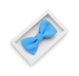 Photo of Stylish light blue bow tie on white background, top view