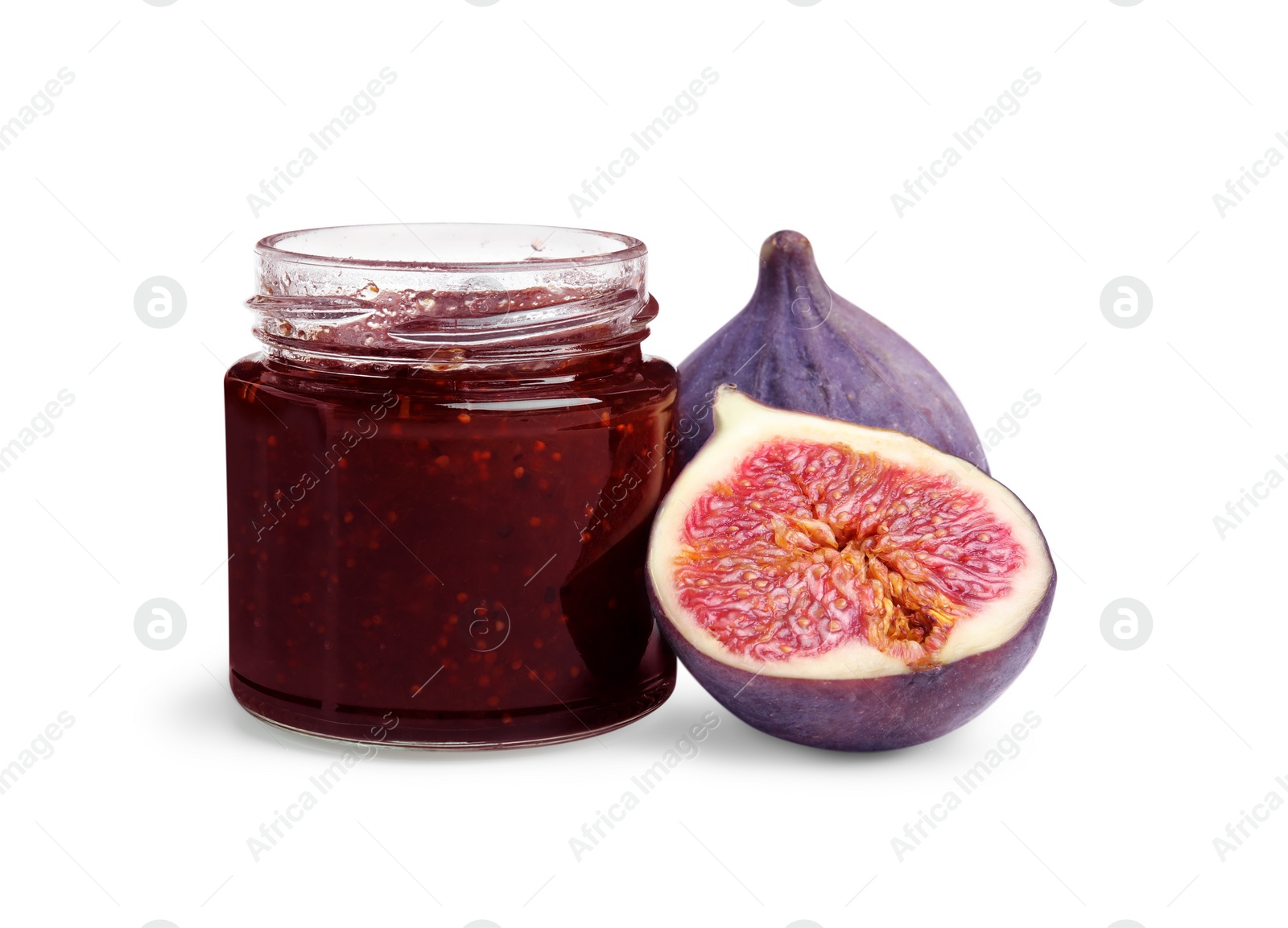 Photo of Glass jar of tasty sweet fig jam isolated on white