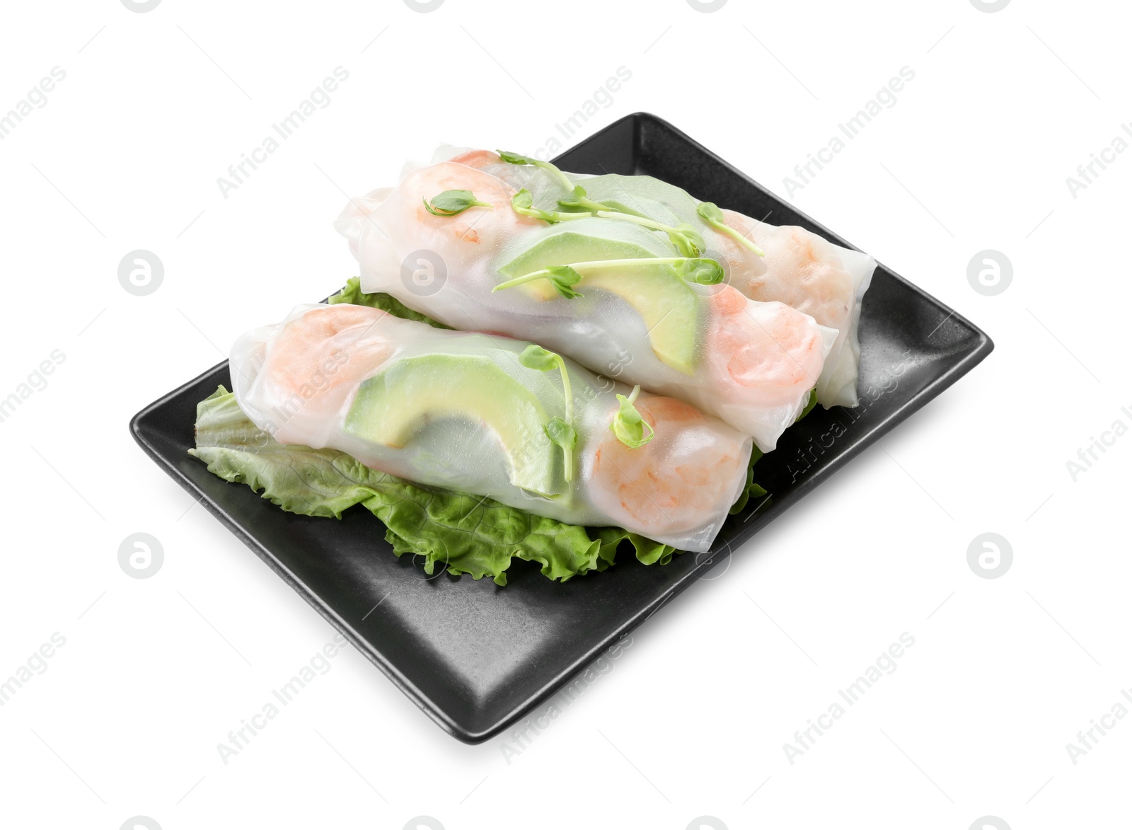 Photo of Delicious spring rolls wrapped in rice paper isolated on white