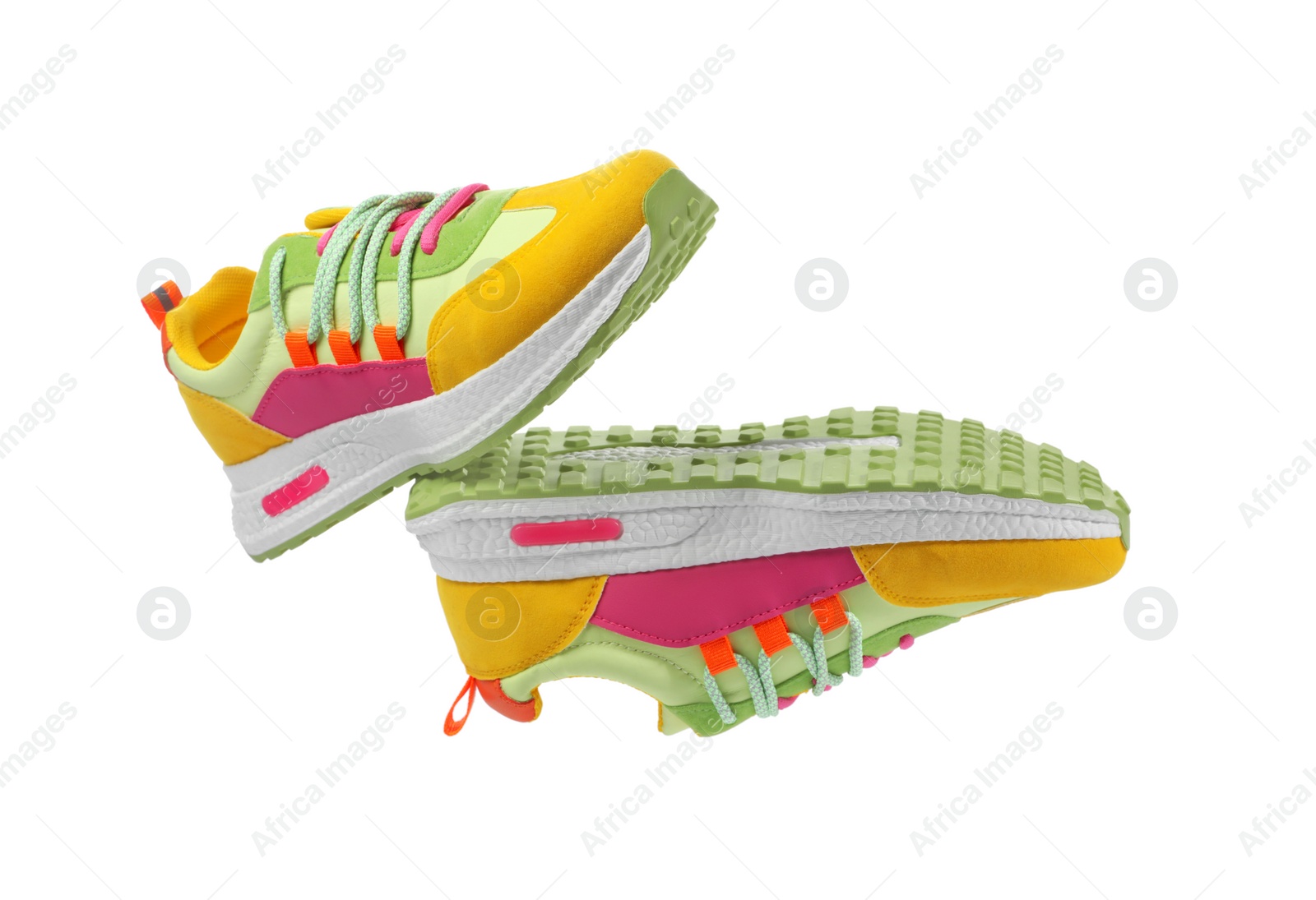 Photo of Pair of stylish colorful sneakers on white background