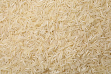 Photo of Heap of rice as background, top view