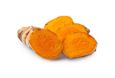 Photo of Slices of fresh turmeric root isolated on white