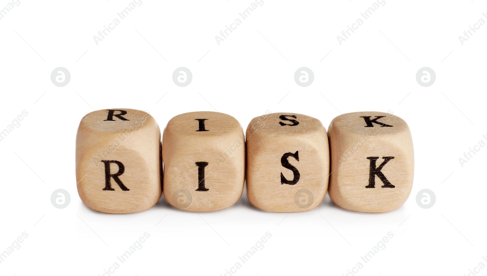 Photo of Word Risk made of small wooden cubes on white background