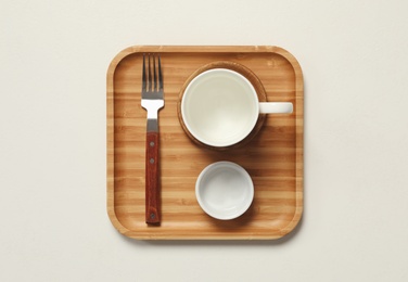 Set of modern cooking utensils on light background, top view