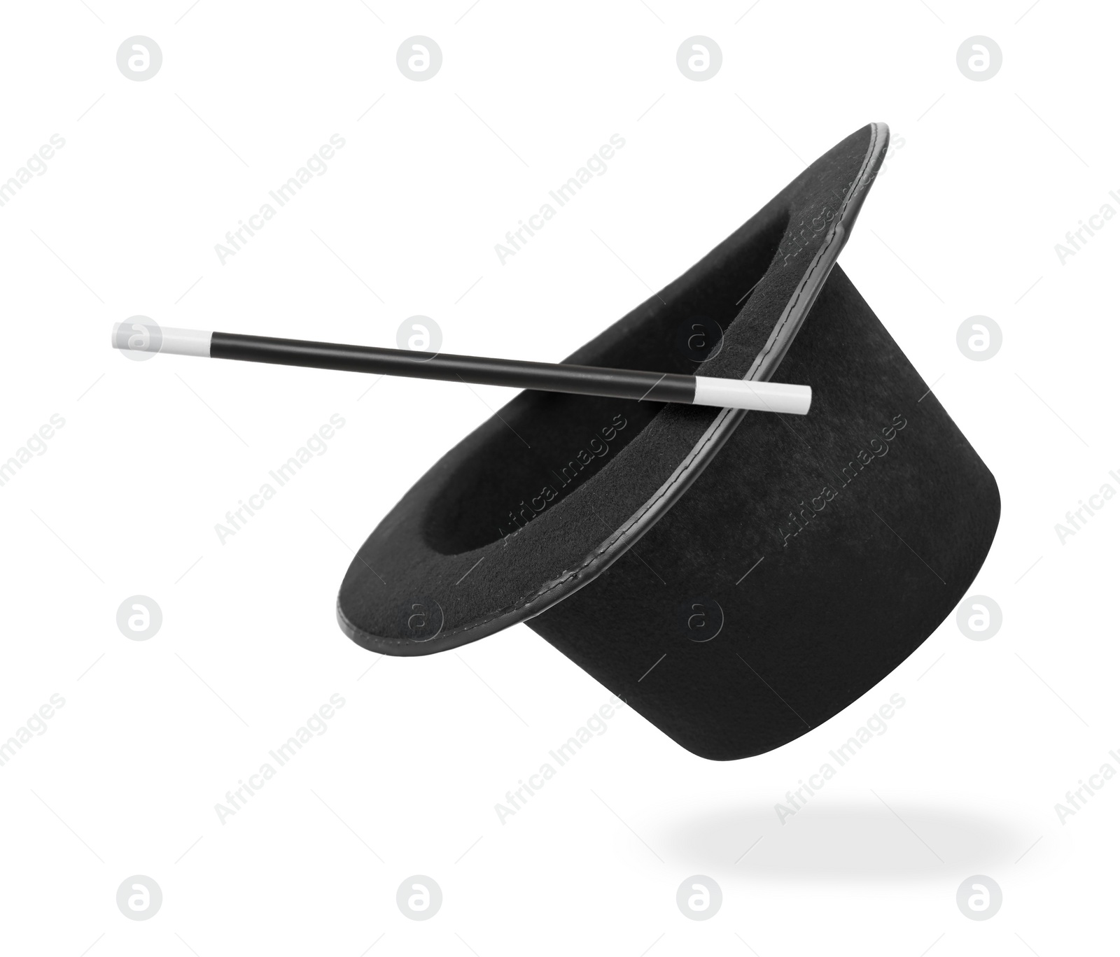 Image of Magic wand and top hat isolated on white. Magician trick